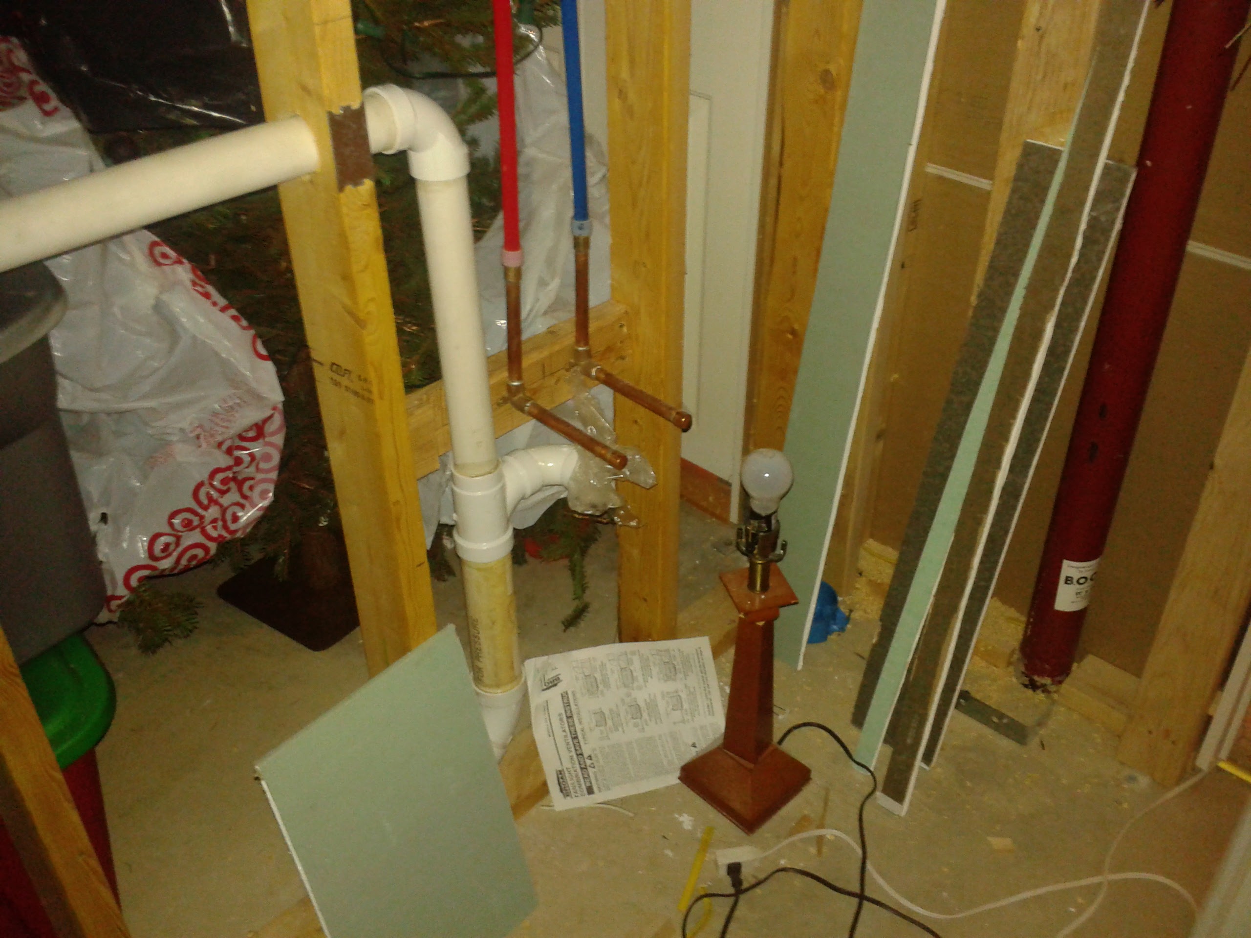 PVC drain and supply lines roughed in during bathroom construction